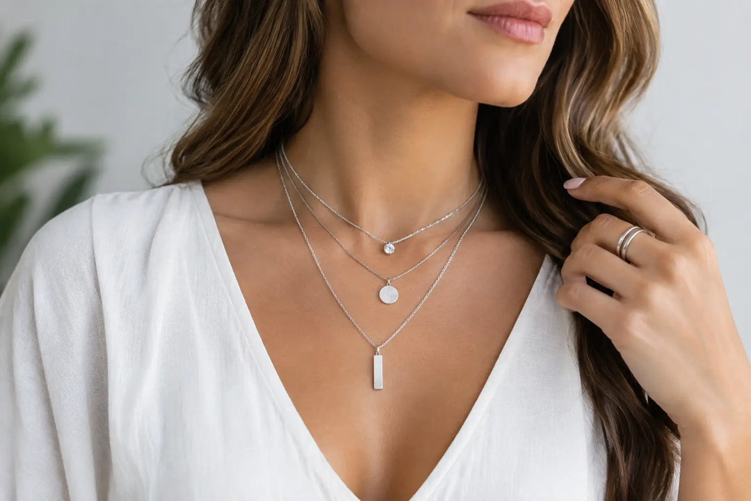 A Guide to Layering Silver Necklaces in Style